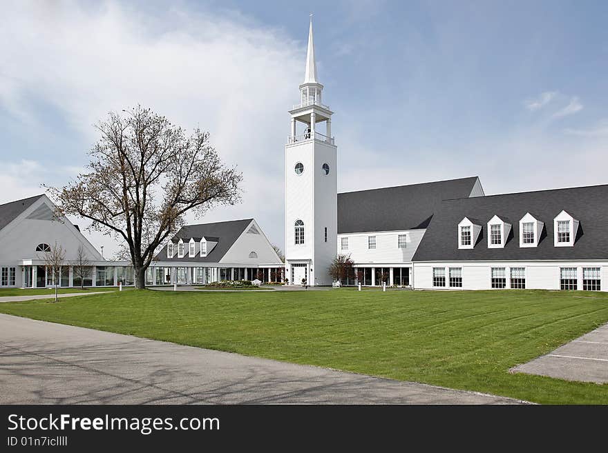 Church with large steeple in suburbs