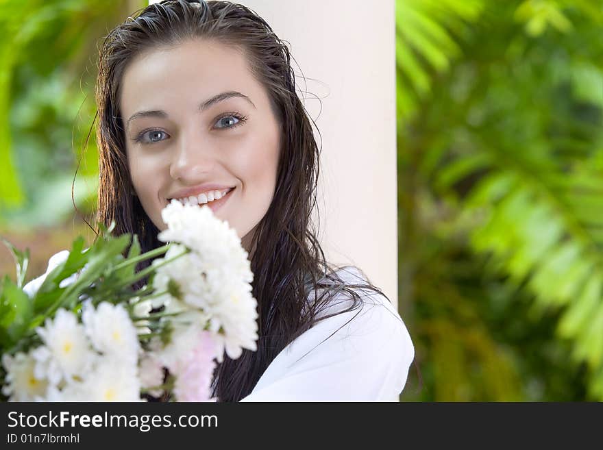 Portrait of young pretty woman in summer environment. Portrait of young pretty woman in summer environment