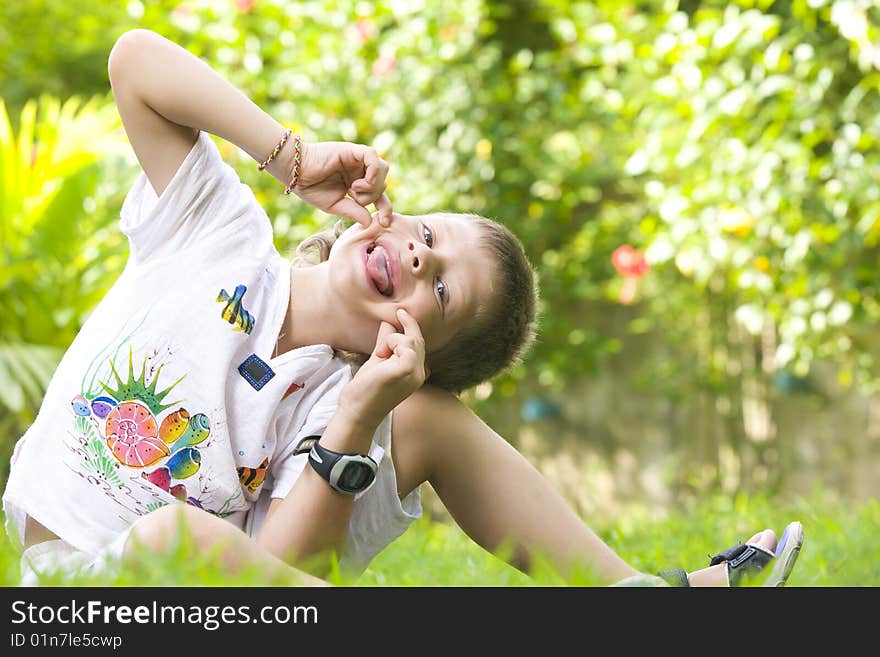 Portrait of little boy having good time in summer environment. Portrait of little boy having good time in summer environment