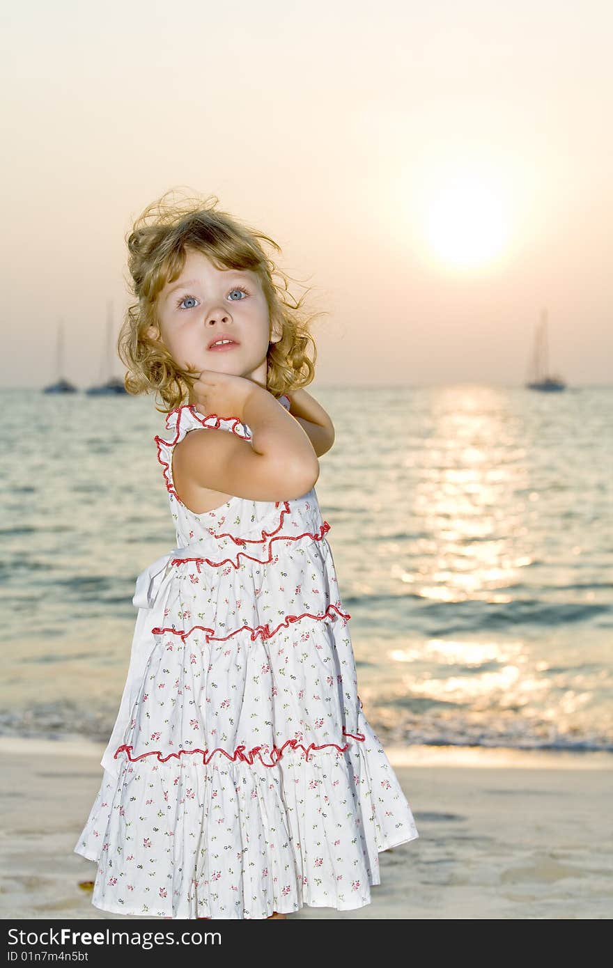 Portrait of little white girl having fun on the beach. Portrait of little white girl having fun on the beach