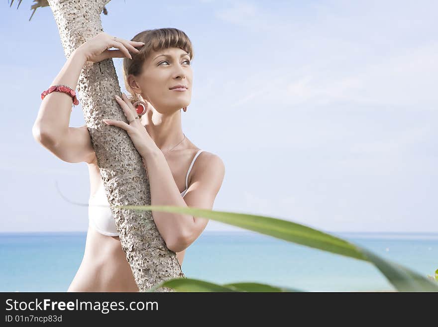 Portrait of beautiful girl having good time on tropical beach. Portrait of beautiful girl having good time on tropical beach