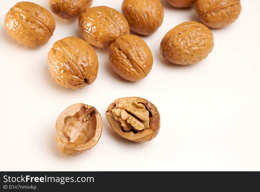 Walnuts isolated on white, one cracked