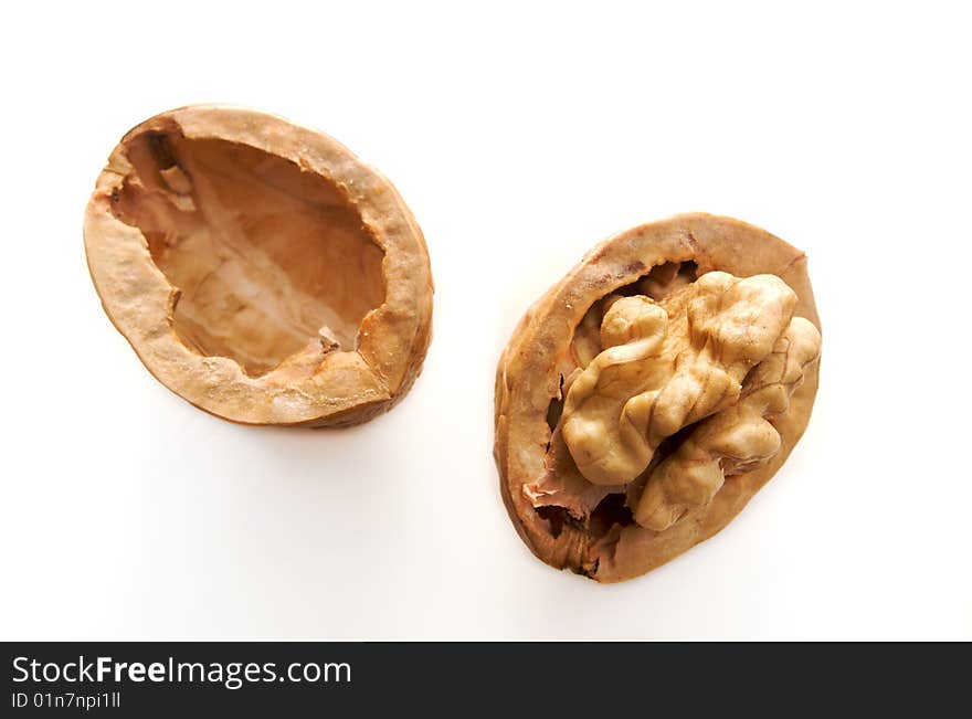 Open cracked walnut isolated on white. Open cracked walnut isolated on white