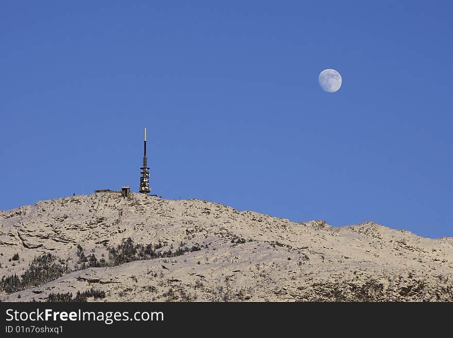 Scene with transmitter and moonrise