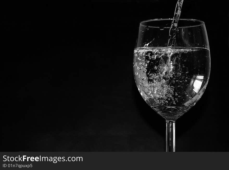 Studio shot of a glass filled with water. Studio shot of a glass filled with water