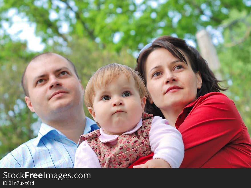 Happy smiling family,parents and little girl. Happy smiling family,parents and little girl