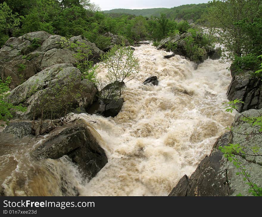 Photo of Great Falls Park rapids in Maryland on an overcast spring day. Photo of Great Falls Park rapids in Maryland on an overcast spring day.