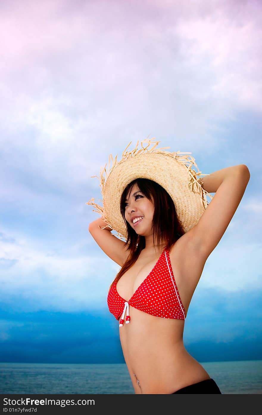 Happy young woman having fun by the beach. Happy young woman having fun by the beach