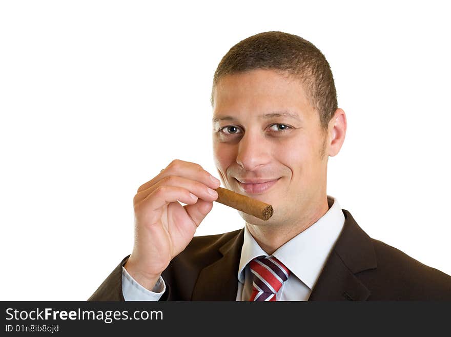 Businessman smells on a cuban cigar. Businessman smells on a cuban cigar