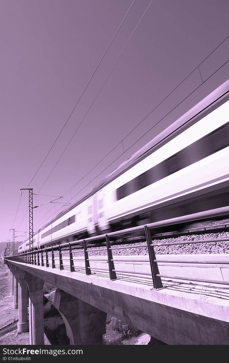 Pink speed train with clear sky