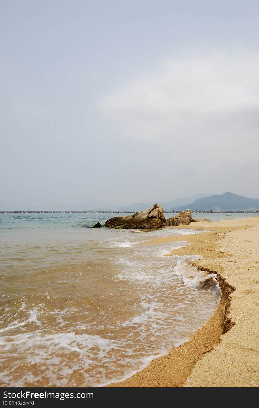 Summer beach and Rock stone