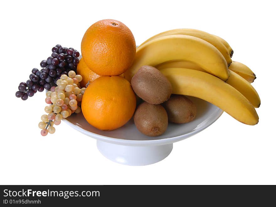 On a plate lined bananas oranges grapes kiwi. On a plate lined bananas oranges grapes kiwi