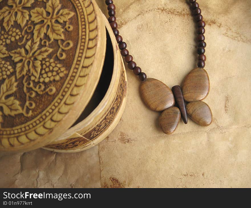 Wooden bead and small box from birch bark