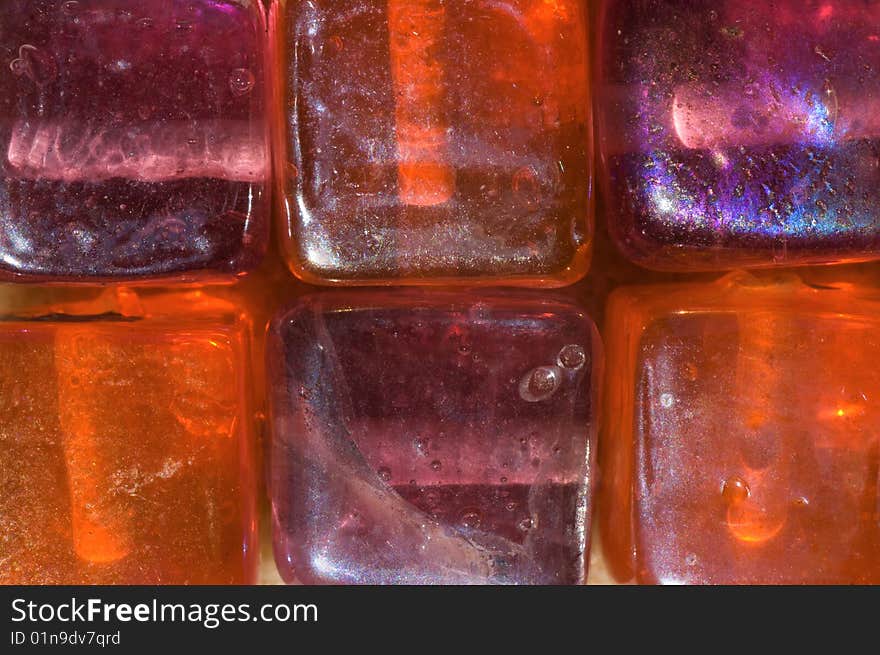 Close-up on glass square beads. Close-up on glass square beads