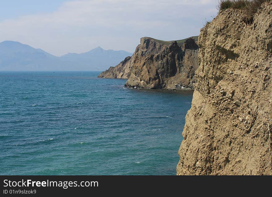 The seascape. Afield Saint mountain and mountain Echkidag. The seascape. Afield Saint mountain and mountain Echkidag