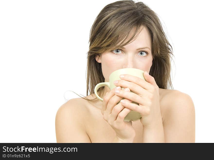 Young attractive  woman drinking tea isolated on white background