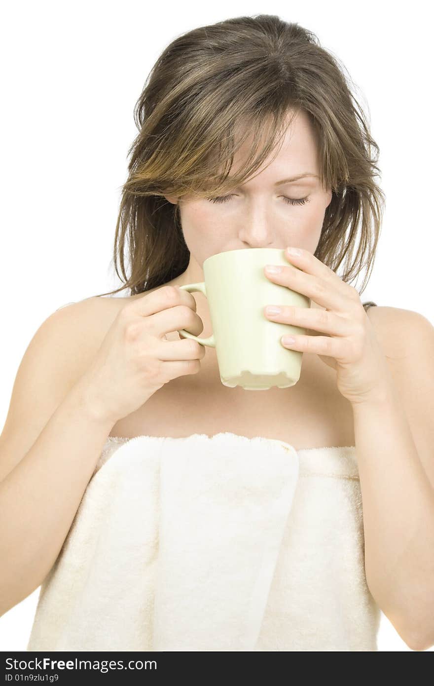 Young attractive  woman drinking tea