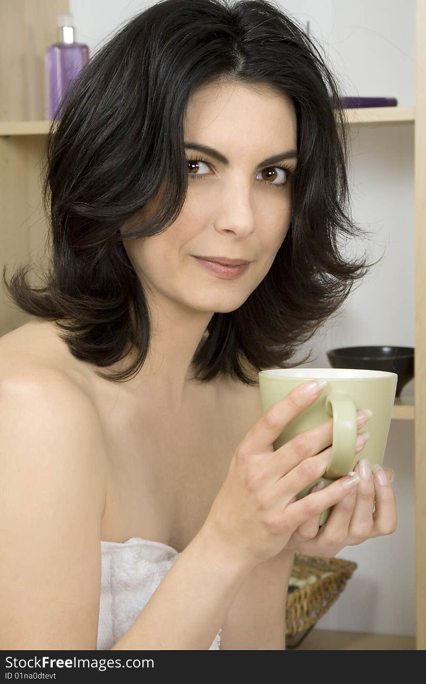 Young attractive  woman drinking tea  at home