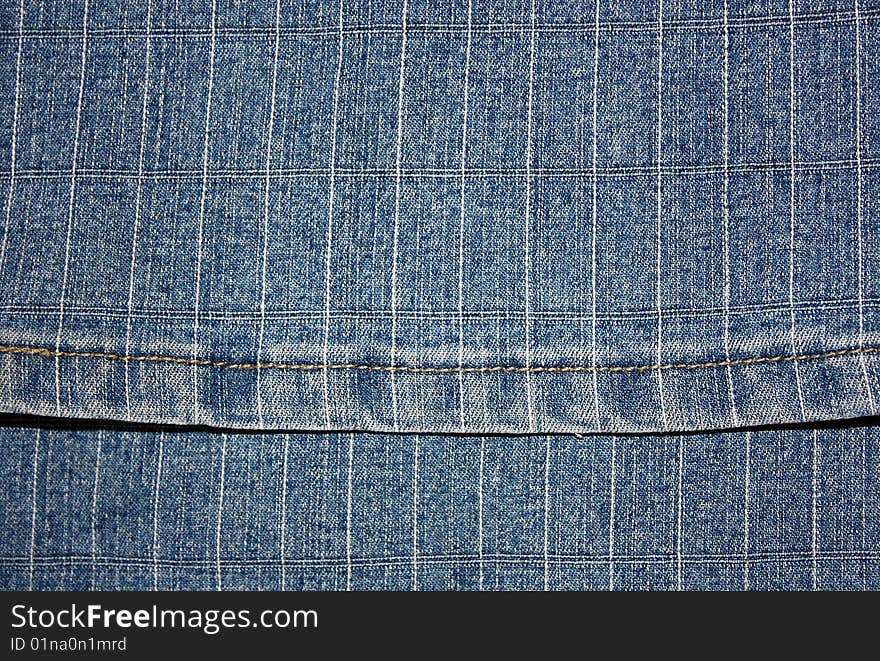 Texture a dark blue jeans fabric in a strip