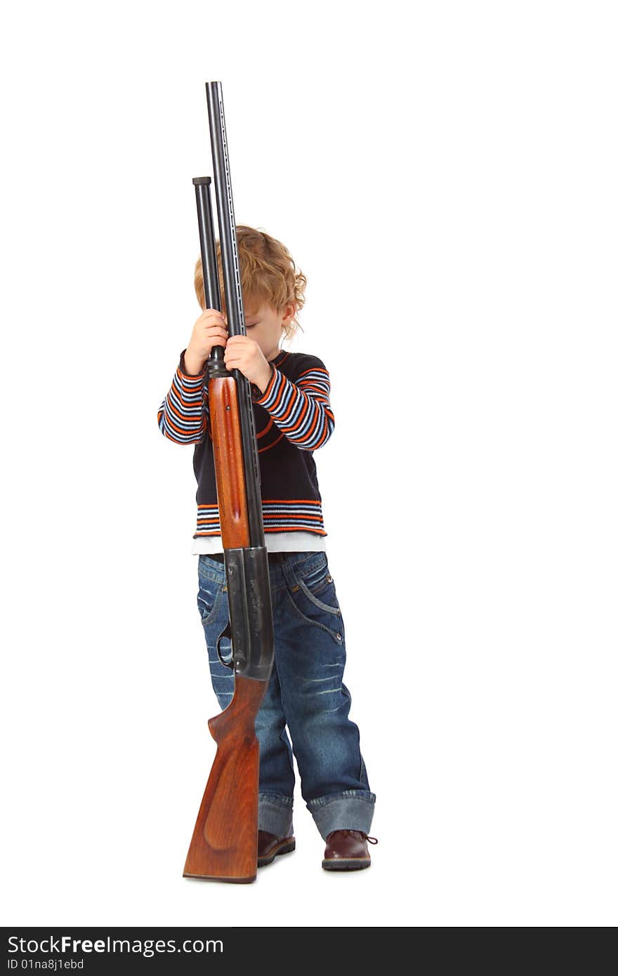 Little boy with gun on white