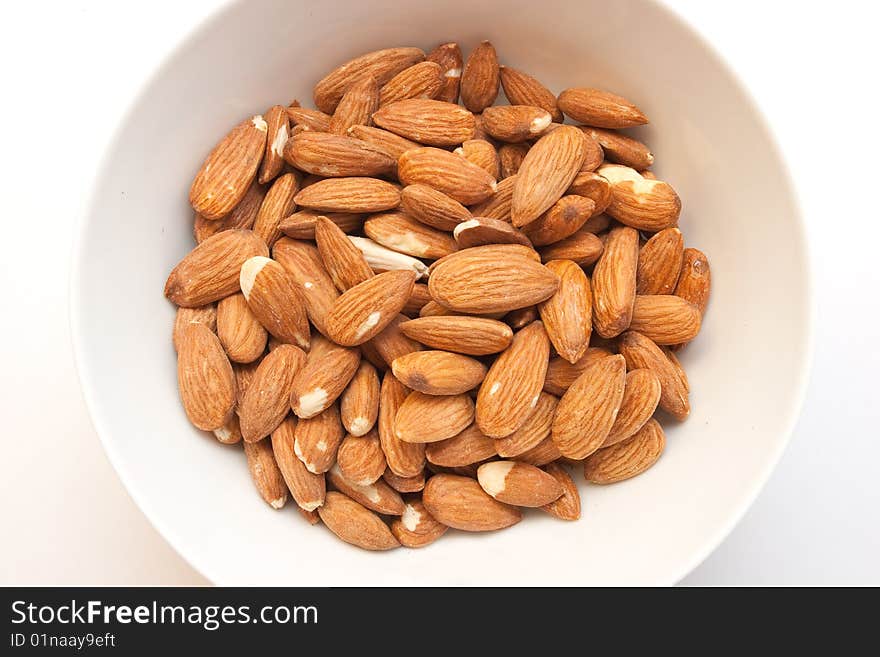 Almonds nut in white plate. Almonds nut in white plate