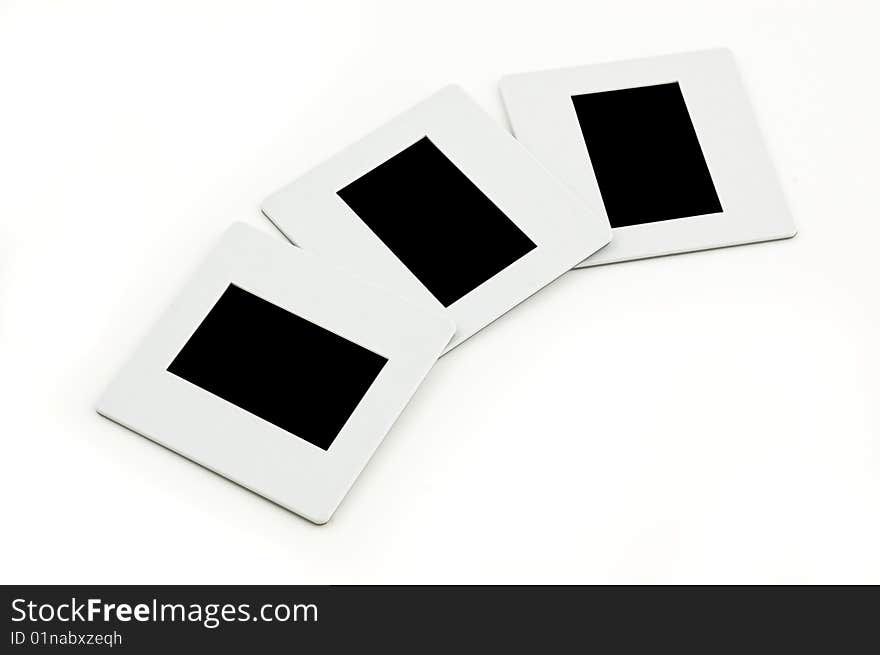 Three slides with plastic frames