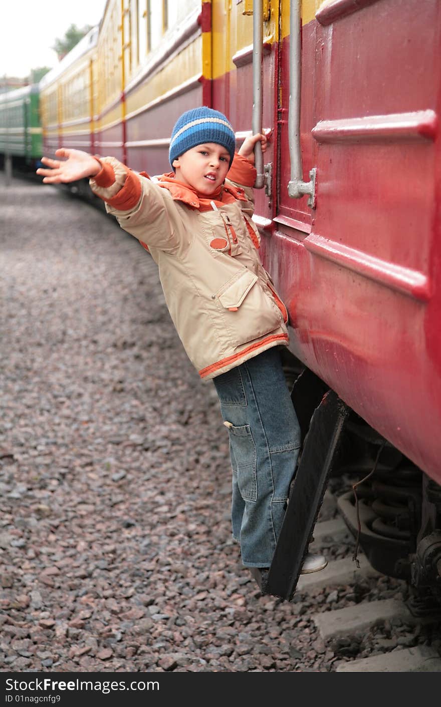 Boy On Footboard Of Passenger Wagon