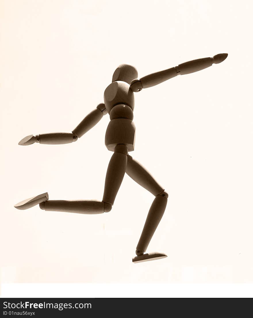 Wooden people figurine running. Activity mannequin. Wooden people figurine running. Activity mannequin.