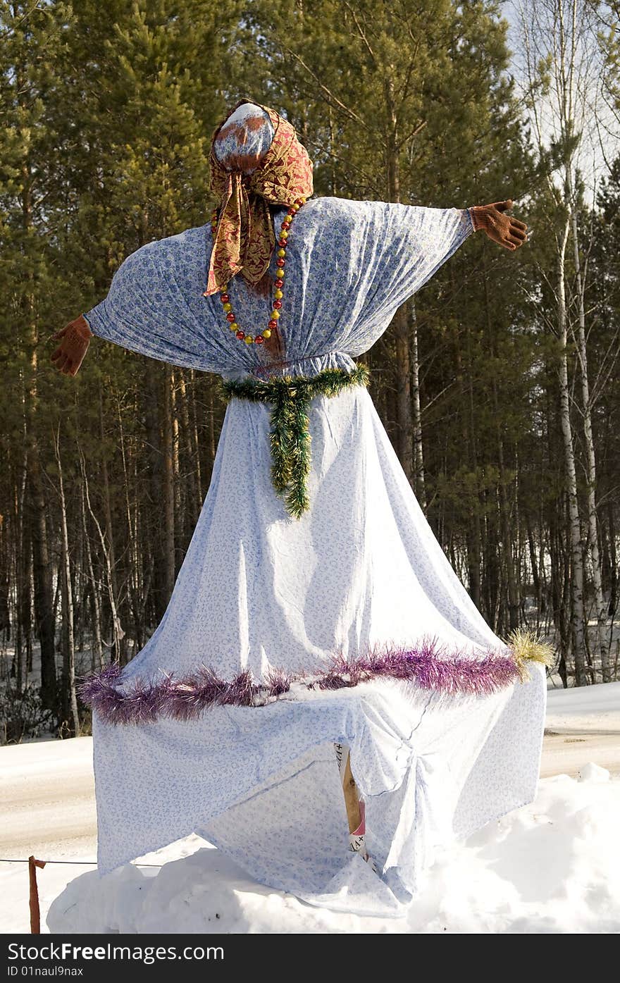 The dressed up snow figure in the form of dressed on snow whom of various clothes. It is a traditional Siberian ceremony of carrying out of winter. The dressed up snow figure in the form of dressed on snow whom of various clothes. It is a traditional Siberian ceremony of carrying out of winter