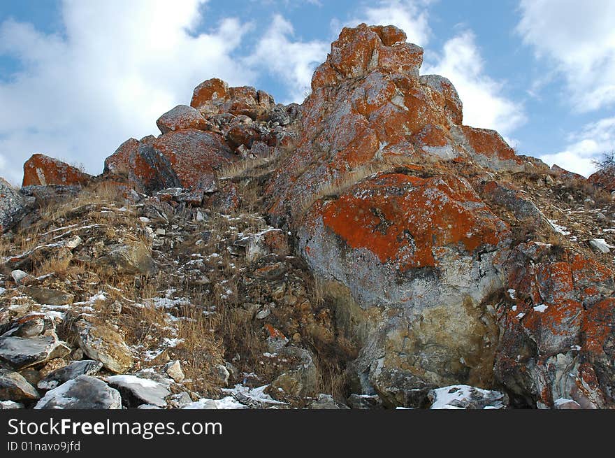 Rocks on a background  blue  the sky .Thoto on island Olkhon, during the years period. Rocks on a background  blue  the sky .Thoto on island Olkhon, during the years period