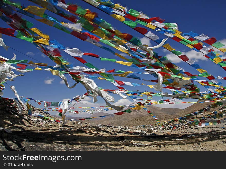 Buddhist flags waving in the himalaya