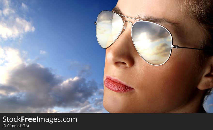 Closeup of woman wearing sunglasses