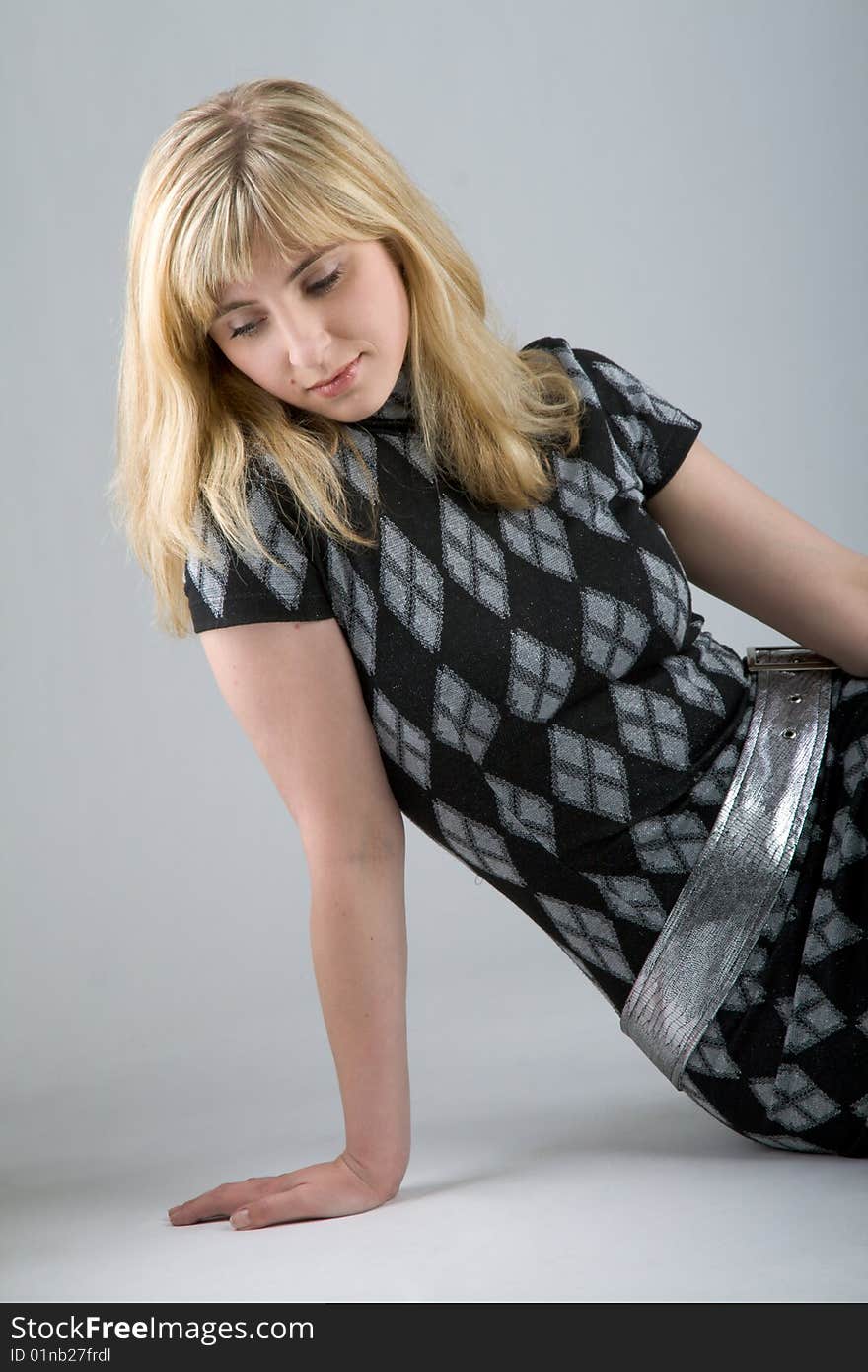 Portrait of a beautiful woman on gray background