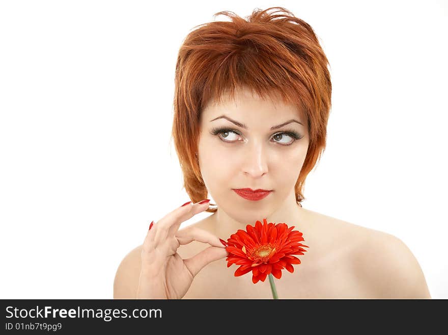 Portrait of the beautiful woman breaking petals of a flower, isolated. Portrait of the beautiful woman breaking petals of a flower, isolated