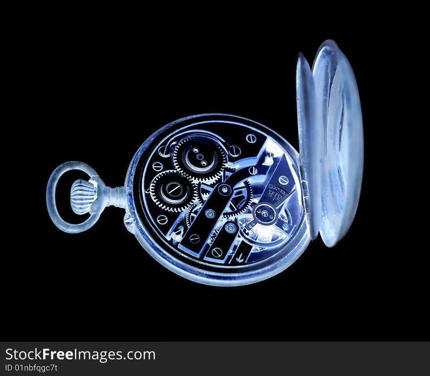 Inverted old watch on a black background with clipping path.