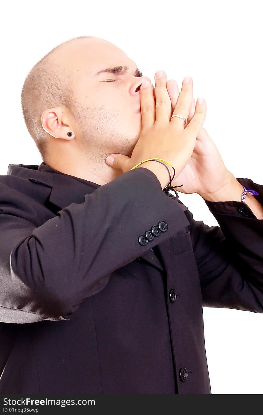 Young man with close eyes on white background