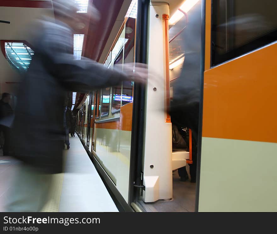 Motion-blur passengers at subway station