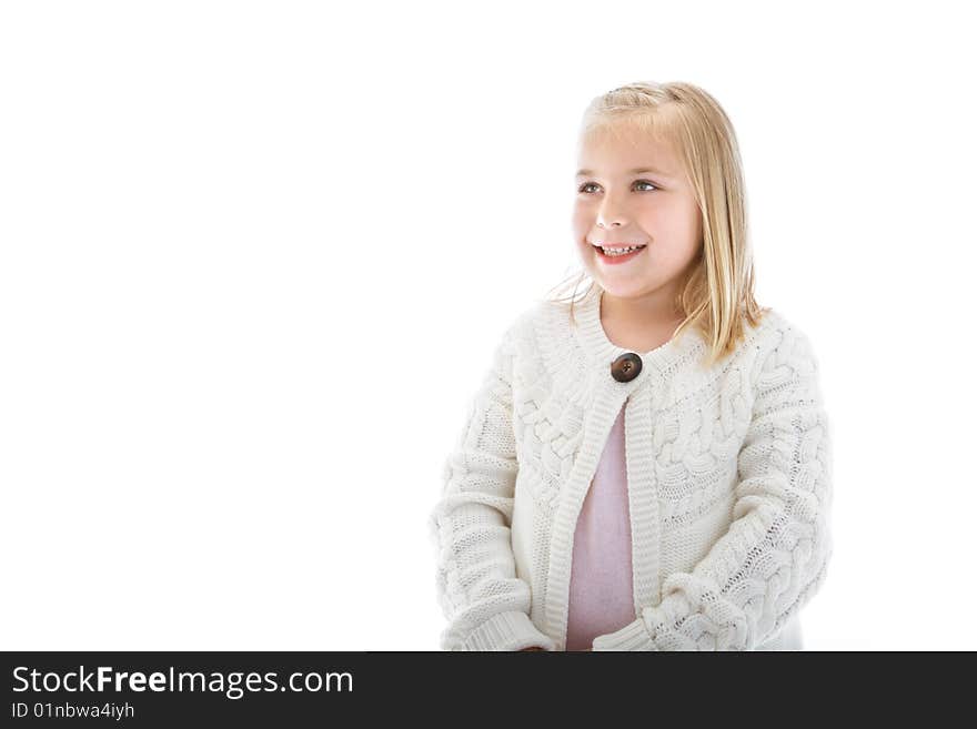 Cute little girl wearing a white sweater