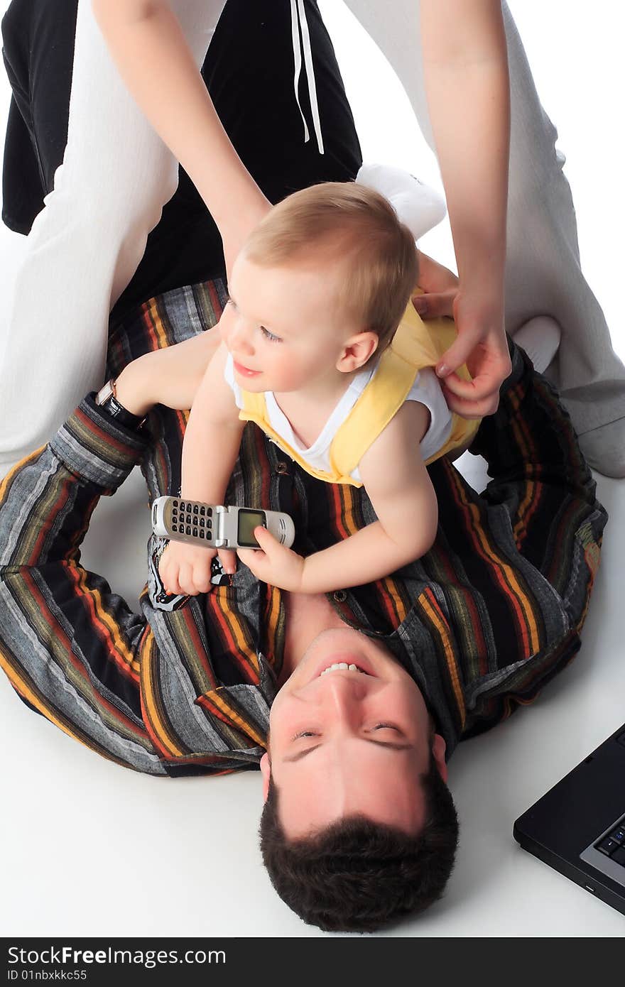 Portrait of a happy family. Shot in a studio. Portrait of a happy family. Shot in a studio.