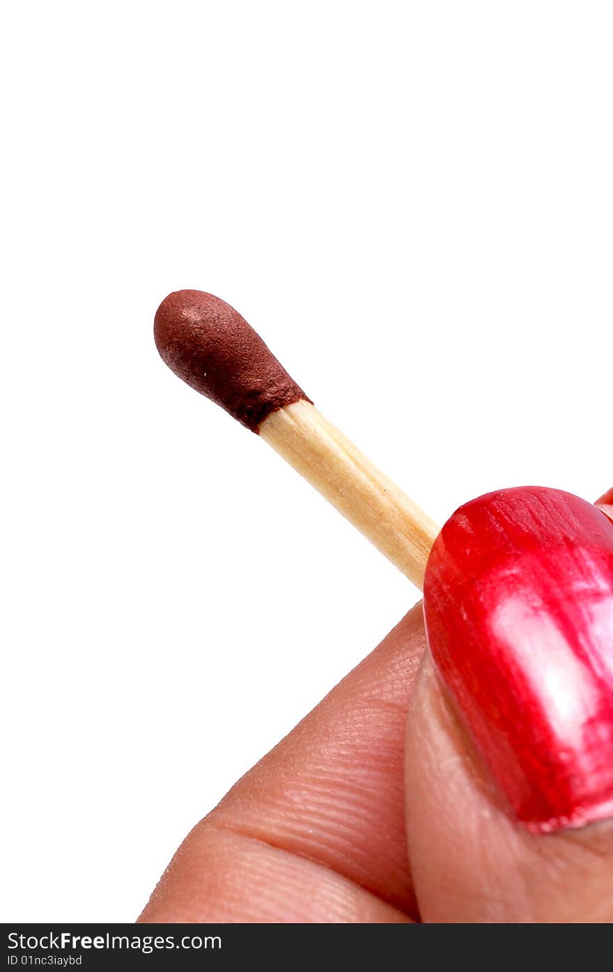 Matchstick closeup isolated on white.