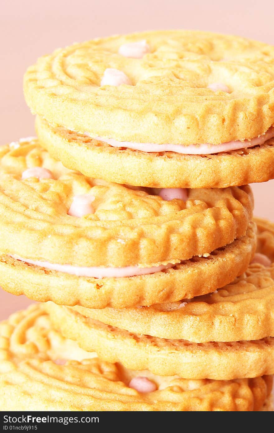 Sweet cookies on pink background. Food picture, Close up. Sweet cookies on pink background. Food picture, Close up