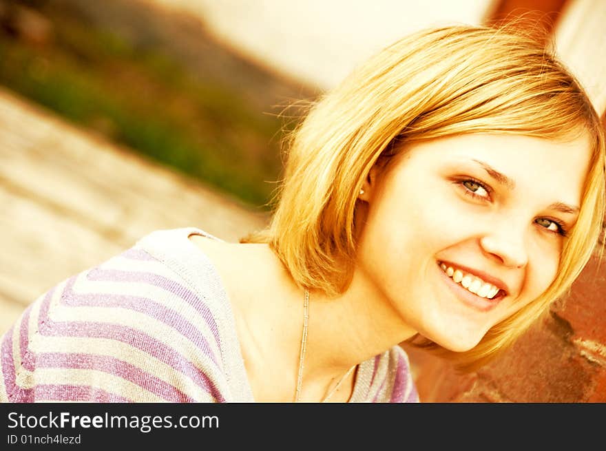 Portrait of young beautiful woman outdoor