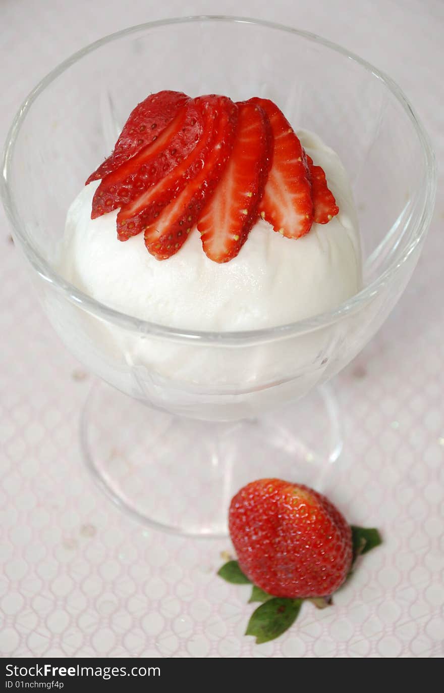 Milk frozen decorated by a strawberry. Milk frozen decorated by a strawberry