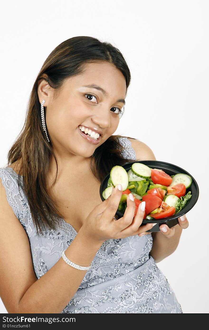 Girl eating salad