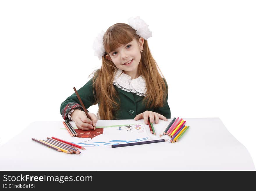 Girl is drawing in pencil. Schoolgirl is painting her family in bright colours. Isolated over white background. Girl is drawing in pencil. Schoolgirl is painting her family in bright colours. Isolated over white background.