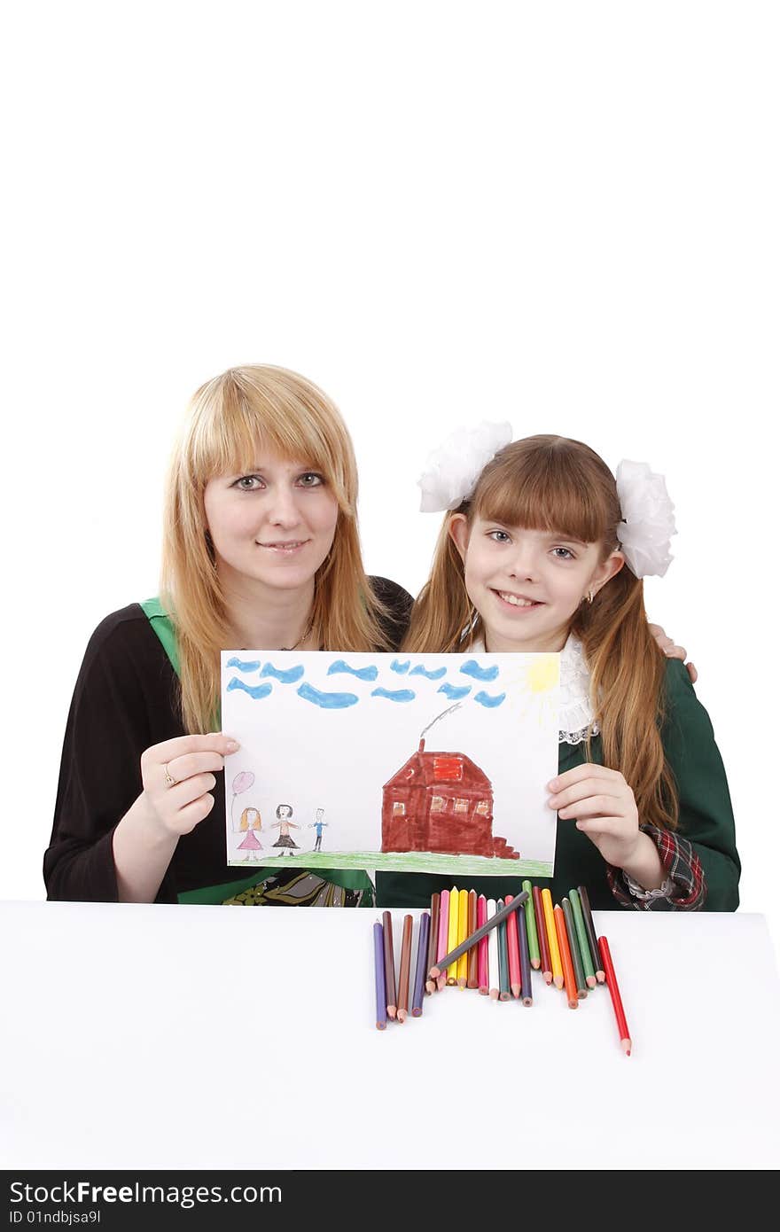 Woman and girl are holding the picture. Mother and her young daughter drawing together. Girl is painting her family in bright colours. Isolated over white background. Woman and girl are holding the picture. Mother and her young daughter drawing together. Girl is painting her family in bright colours. Isolated over white background.