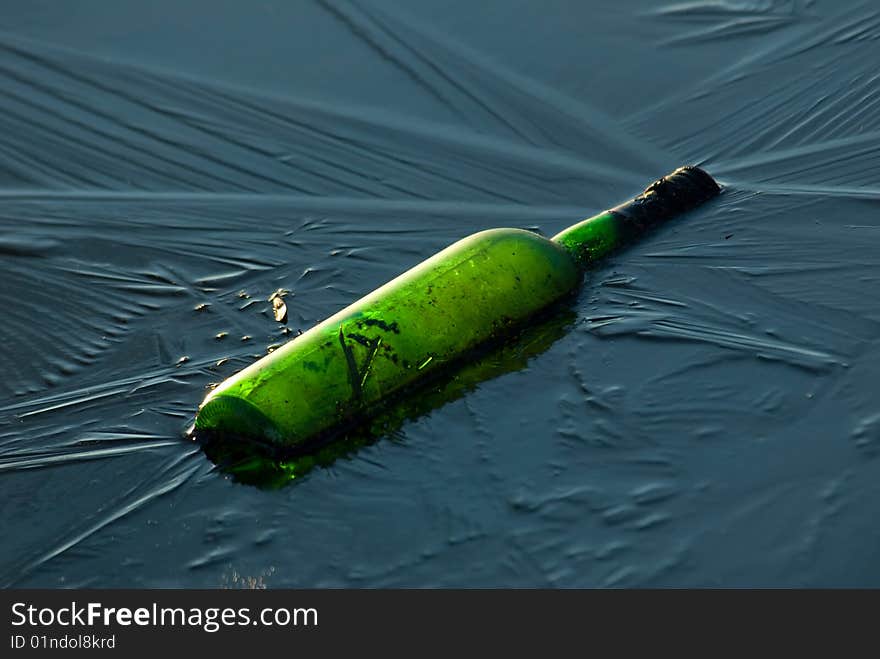 A Bottle In Frozen Water