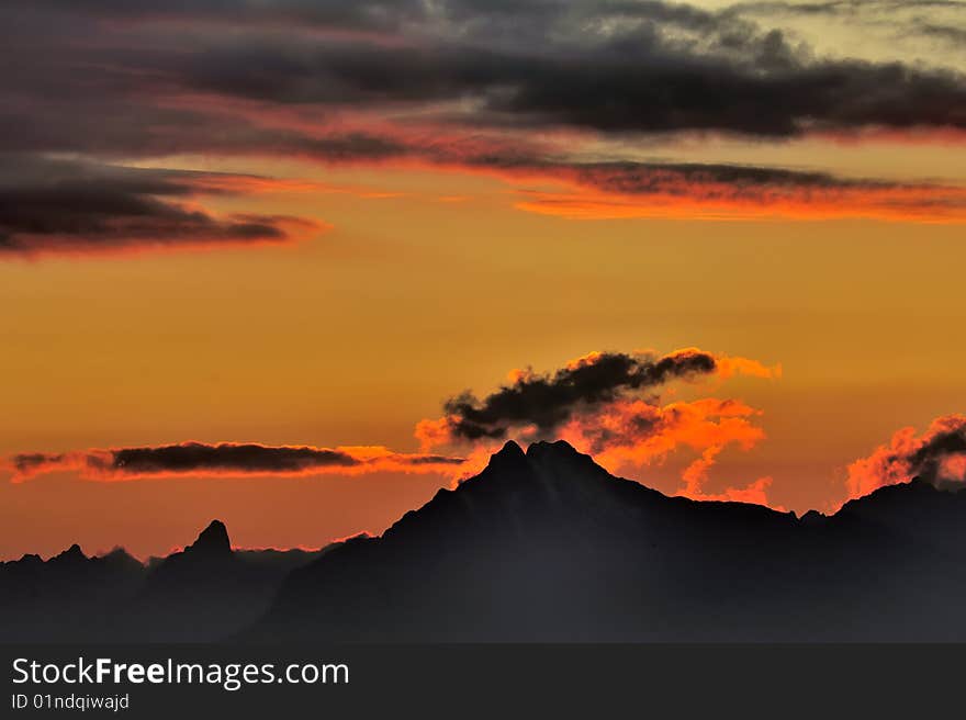 Sunset behind mountains