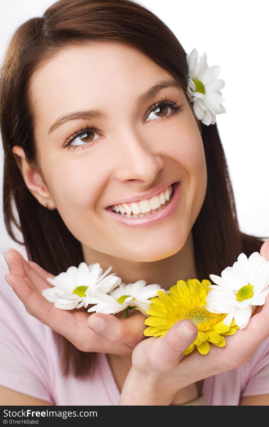 Beautiful young woman with flowers close up. Beautiful young woman with flowers close up