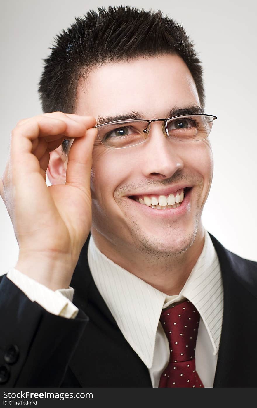 Young happy business man close up portrait